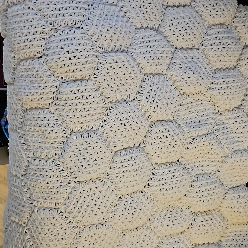 Off white crocheted throw octagonal pattern